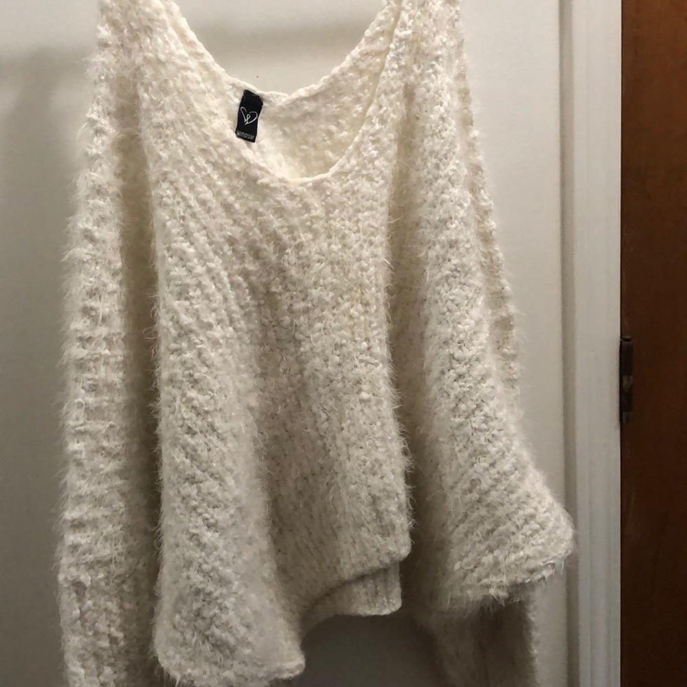 Soft and fluffy off the shoulder white sweater!